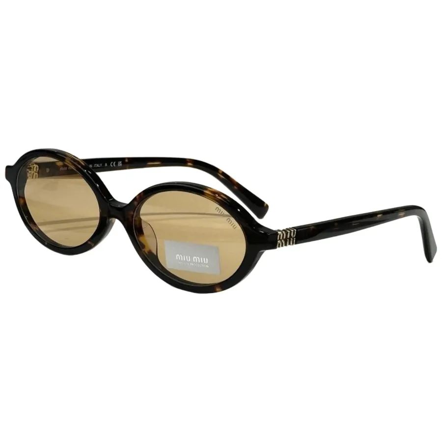 Miu Miu Oval glasses leopard tawny/transparent/ivory/black silver/black/leopard grey/transparent leopard color Size 50-18-140