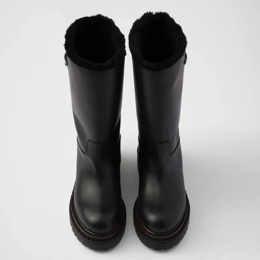 PRADA Black leather and sheepskin boots