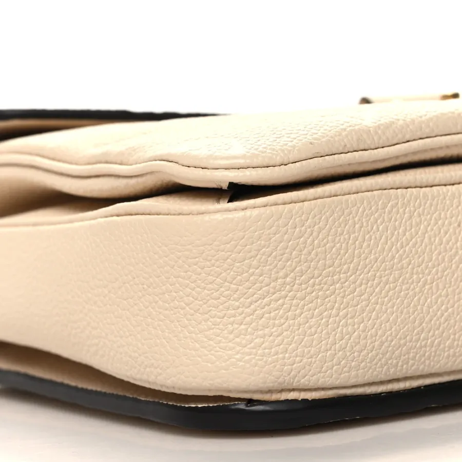 Louis Vuitton Pochette Metis PM Creme Monogram Empreinte Leather Brass Hardware
