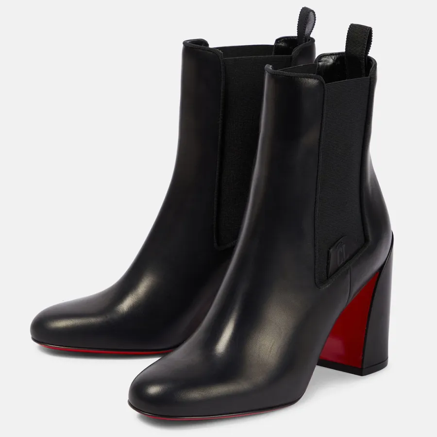 Christian Louboutin Black thick soles with thick heels and bare boots