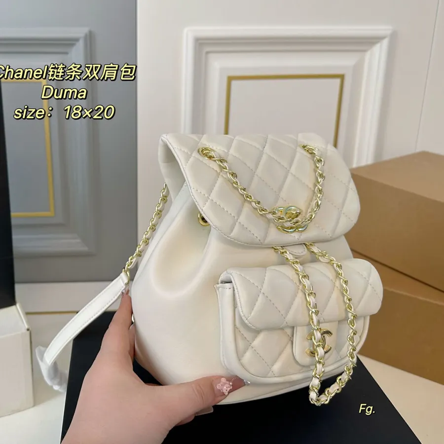 Chanel Pink / Yellow / White / Black Quilted Lambskin Leather Backpacks