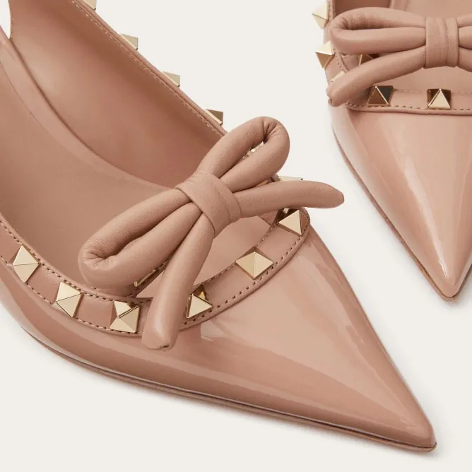 VALENTINO Lace-up heels in patent leather with rivet bow in the same color (heel height: 6cm)