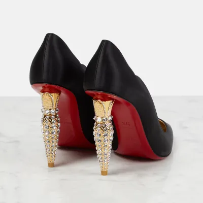 Christian Louboutin Black heels with crystal embellished heel of shoe
