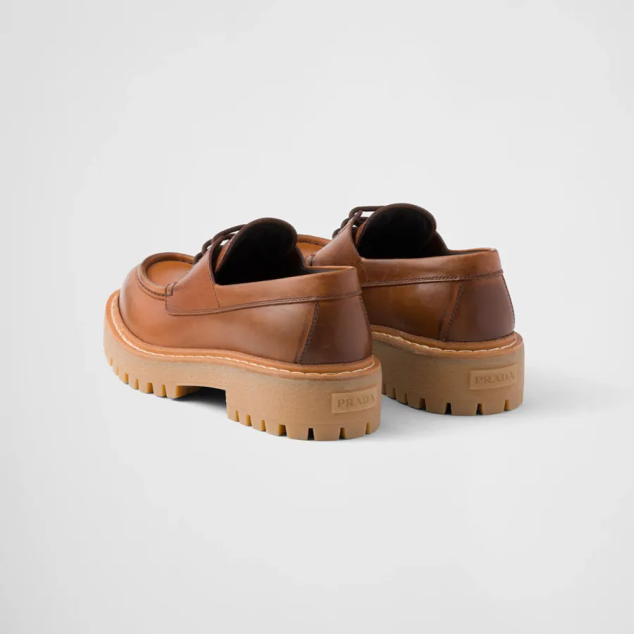 PRADA Lace-up leather loafers in cognac