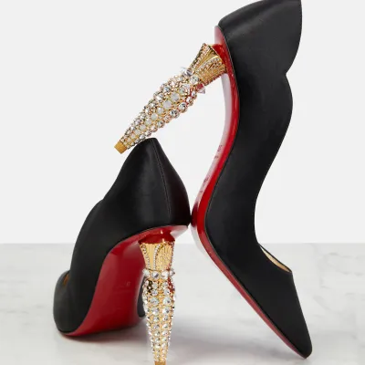 Christian Louboutin Black heels with crystal embellished heel of shoe