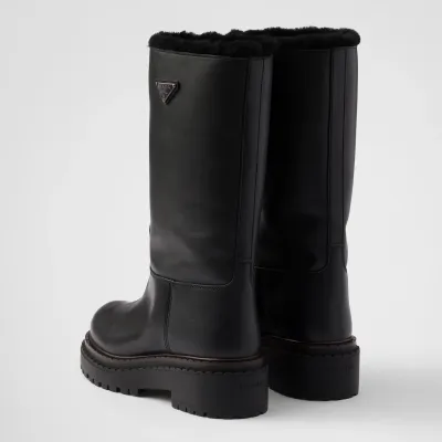PRADA Black leather and sheepskin boots