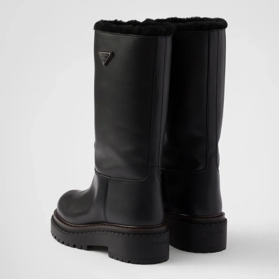 PRADA Black leather and sheepskin boots