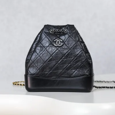 Chanel Black / Blue / White / Pink / Milk tea color Quilted Leather Backpacks