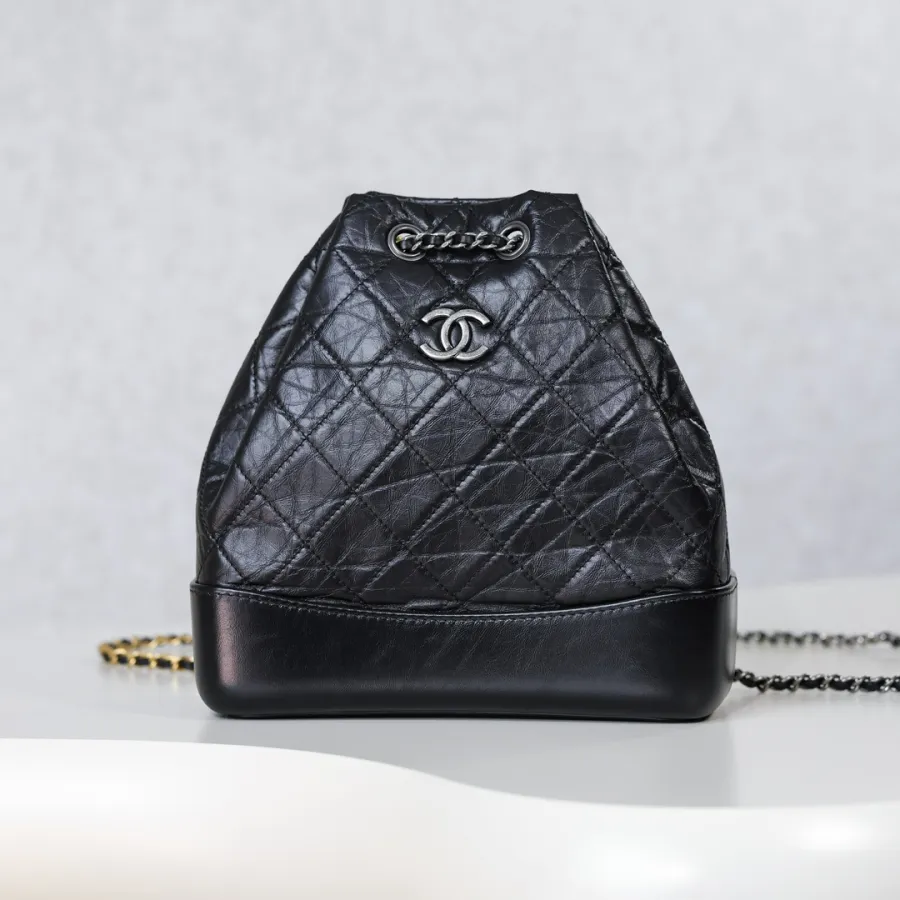 Chanel Black / Blue / White / Pink / Milk tea color Quilted Leather Backpacks