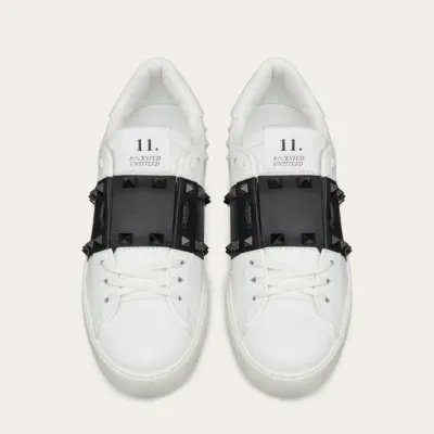 VALENTINO Women's studded calf leather sneakers in the same color