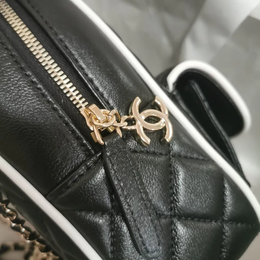 Chanel Black / White Quilted  Lambskin Leather