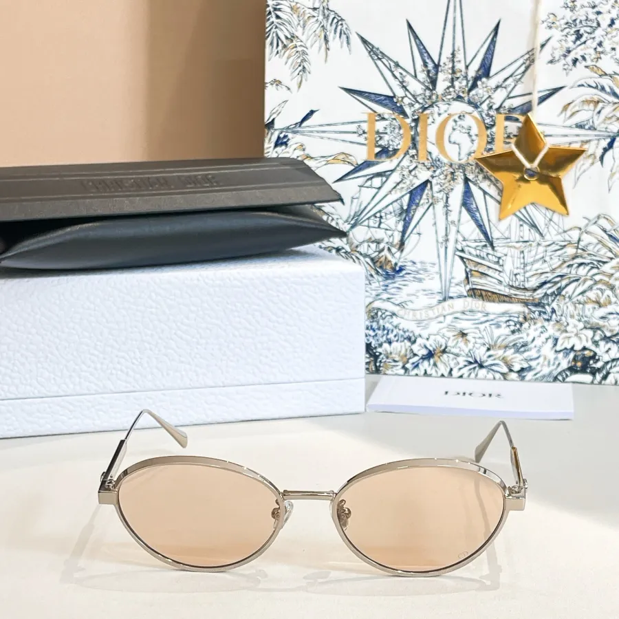 DIOR oval frame glasses silver tawny color Size 55口18-140