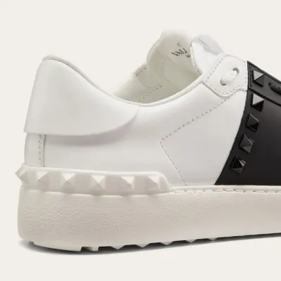 VALENTINO Women's studded calf leather sneakers in the same color