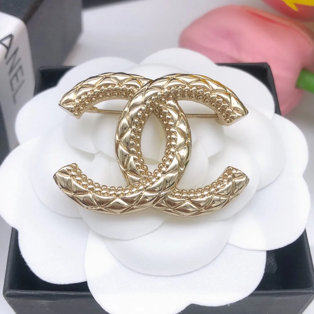 cc Brooch