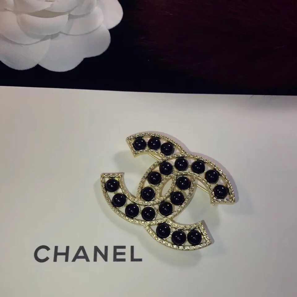 cc Brooch