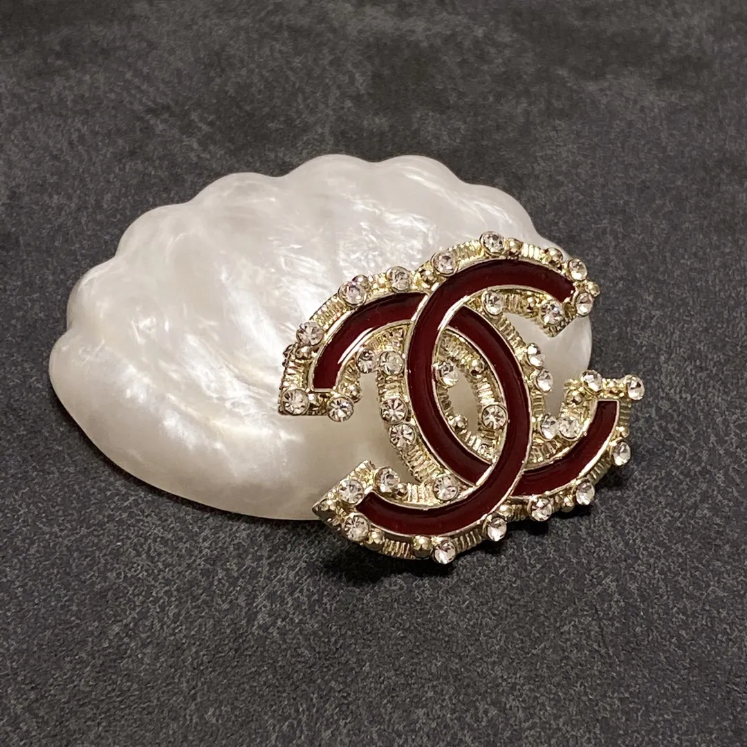 cc Brooch