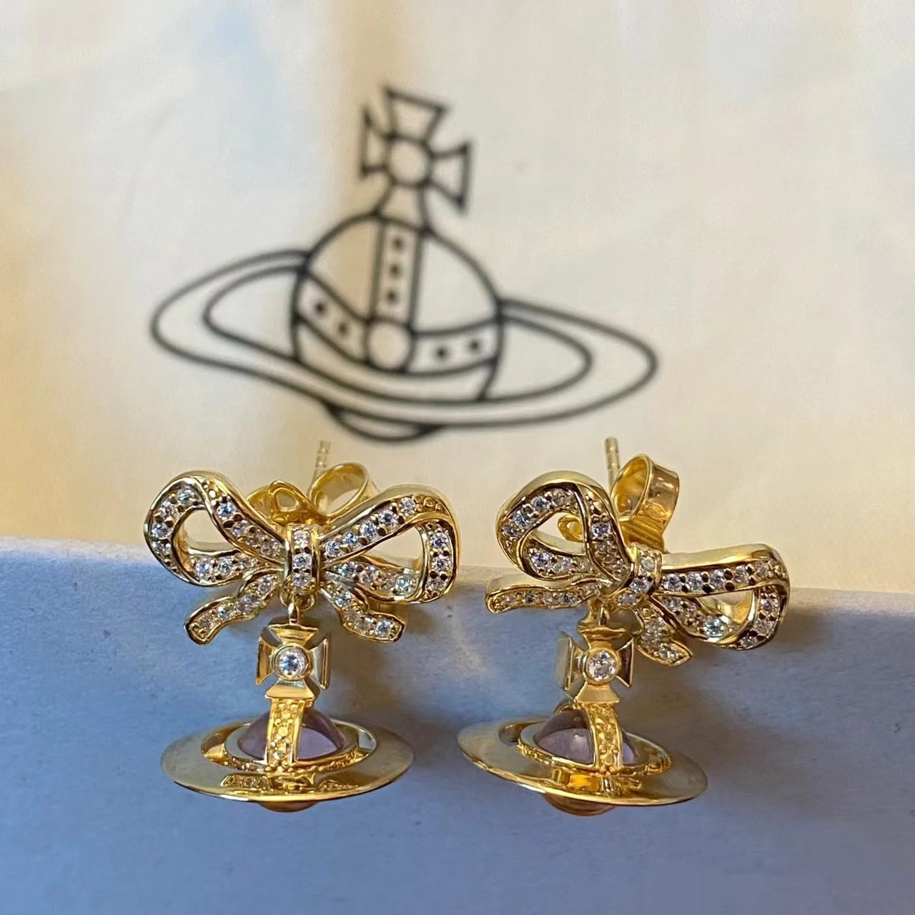 Vivienne Westwood Bowknot Crystal Saturn Earrings - Best Replica Jewelry™