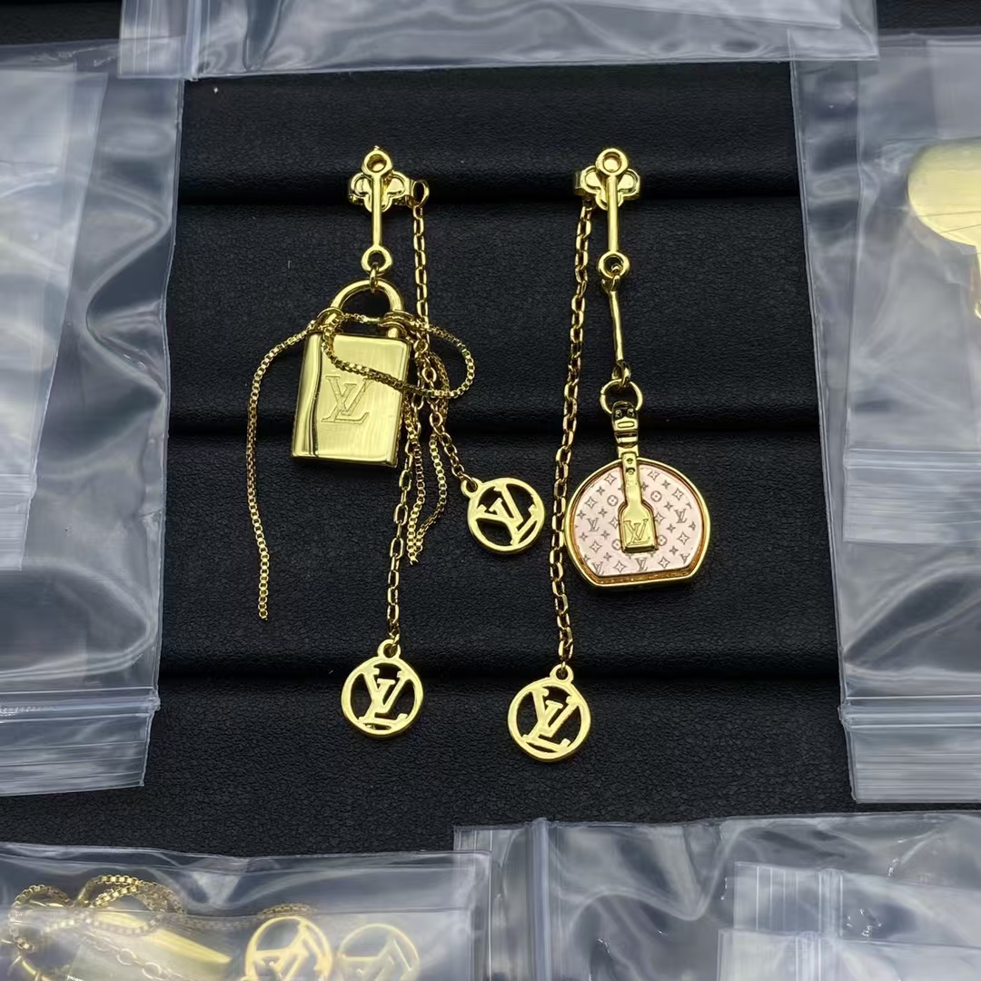 Louis Vuitton Asymmetric Lock Earrings - Best Replica Jewelry™