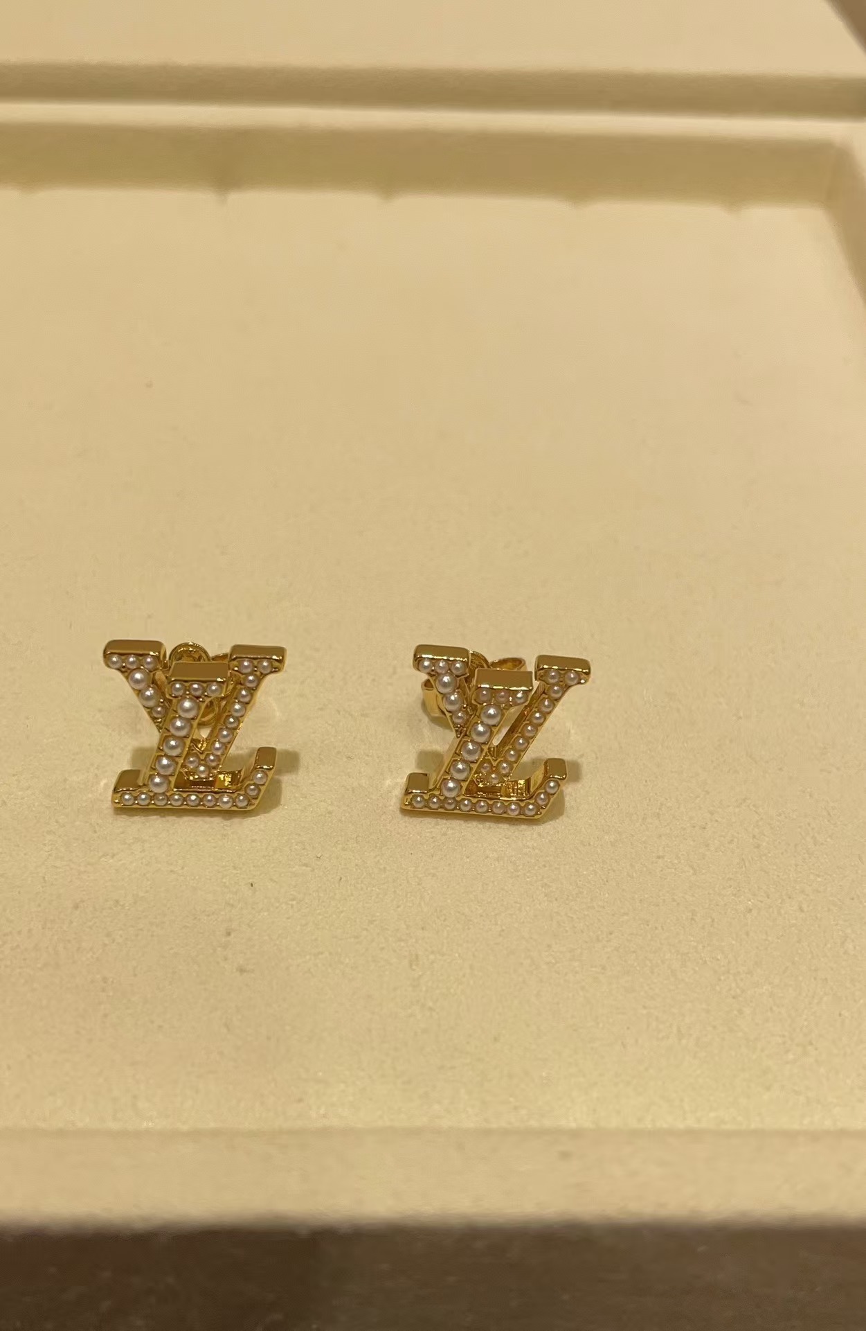 Louis Vuitton Pearl Paved LV Letter Stud Earrings - Best Replica Jewelry™