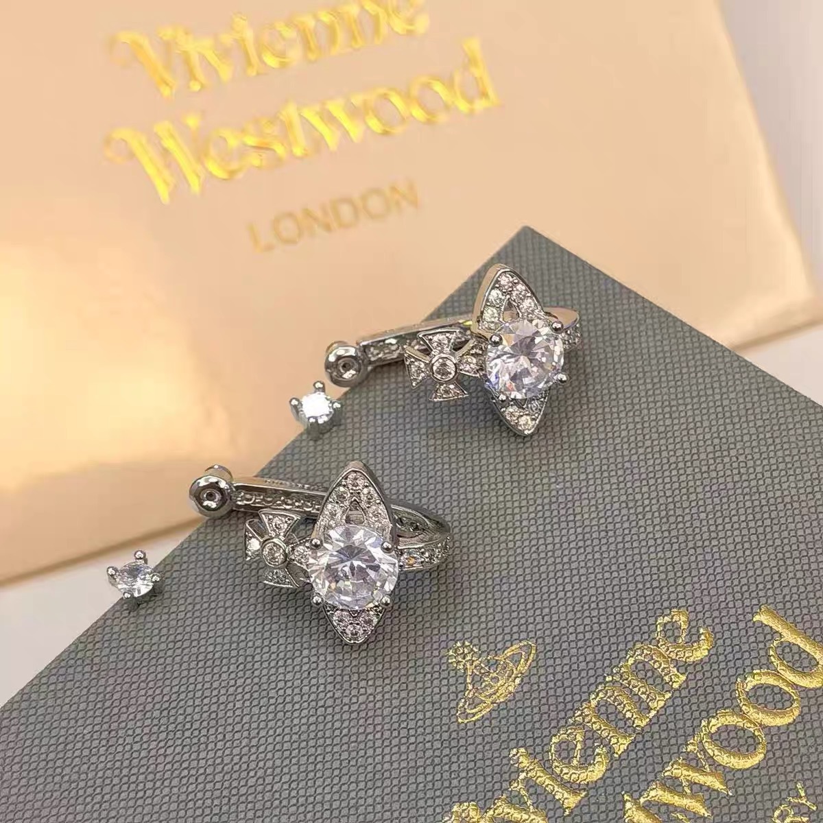Vivienne Westwood Pink White Diamond Saturn Earrings - Best Replica Jewelry™