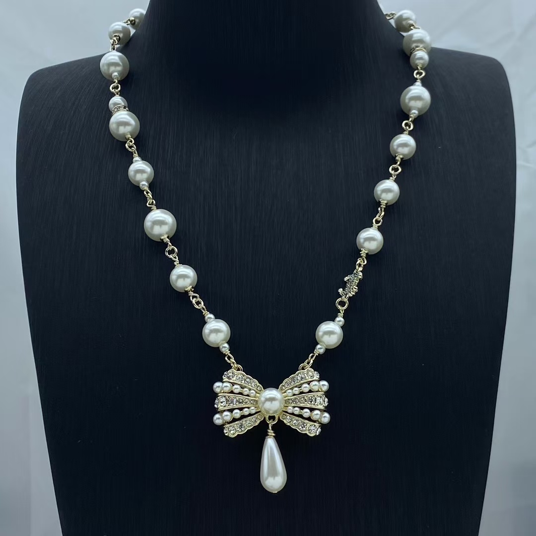 Chanel Sweet Bowknot with Teardrop Pearl Pendant Necklace - Best Replica Jewelry™