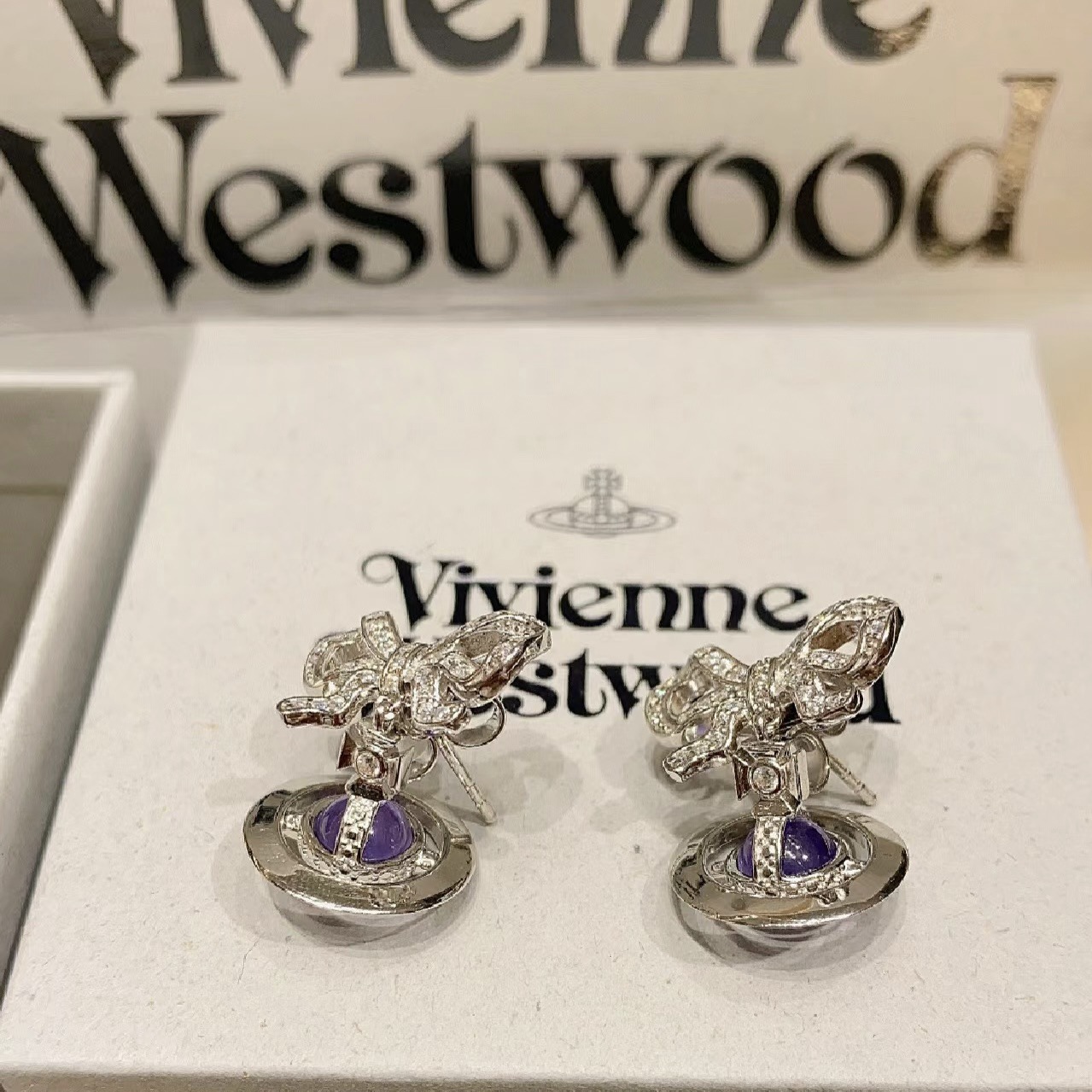 Vivienne Westwood Bowknot Crystal Saturn Earrings - Best Replica Jewelry™