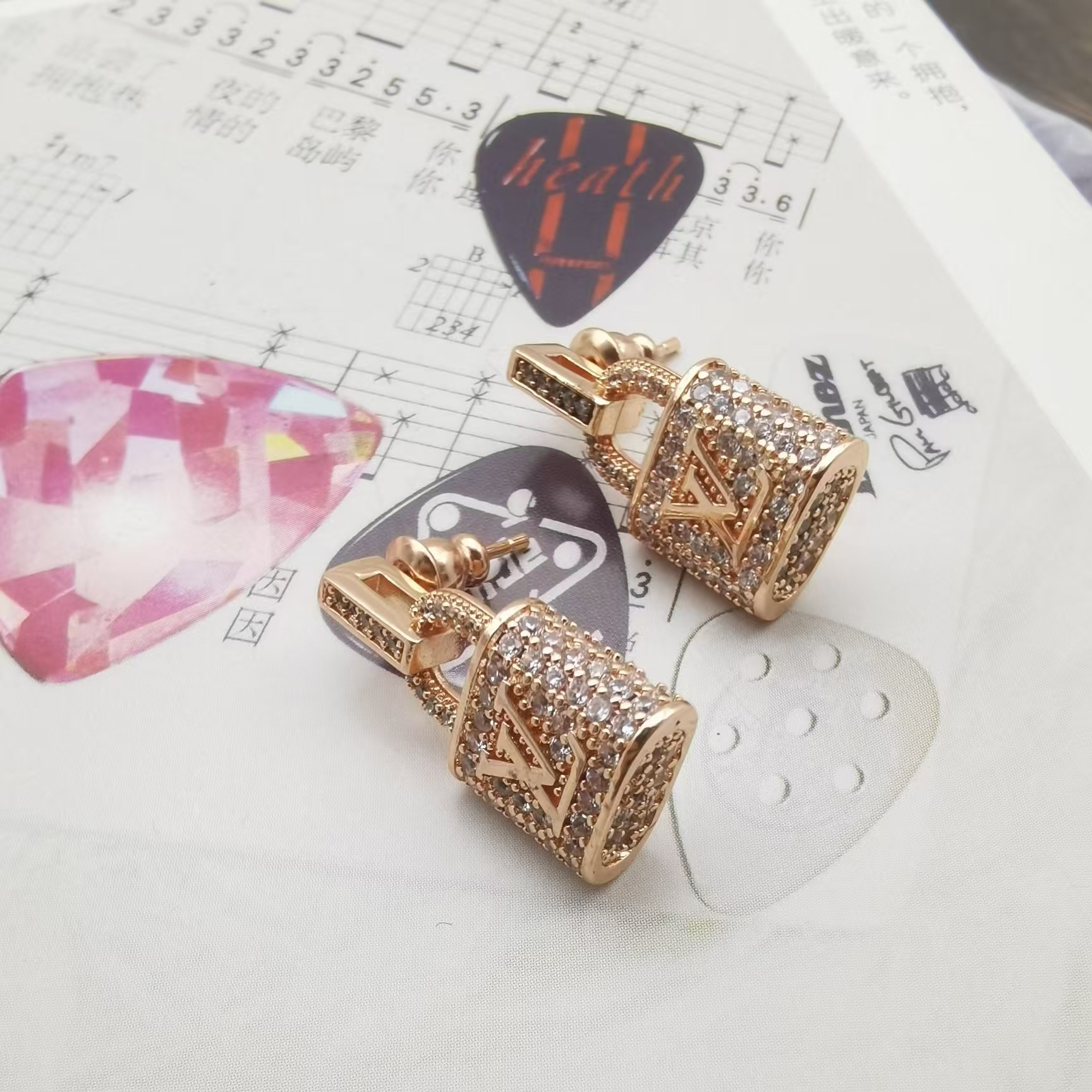 Louis Vuitton Lock Earrings - Best Replica Jewelry™