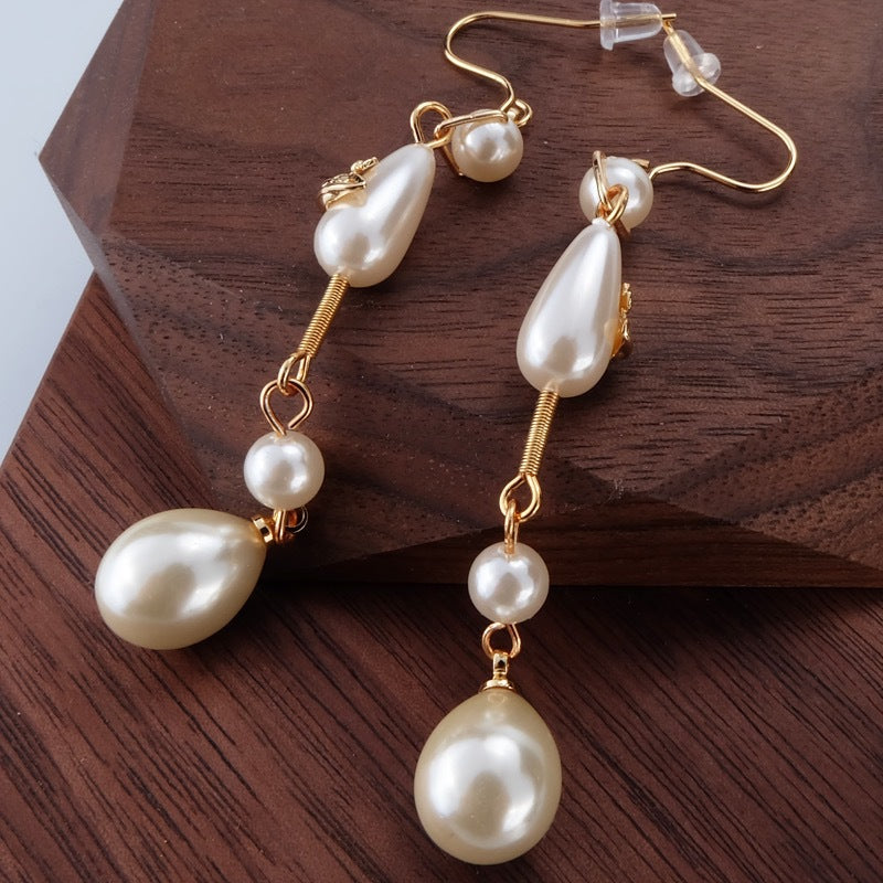 Vivienne Westwood Teardrop Pearl Saturn Earrings - Best Replica Jewelry™
