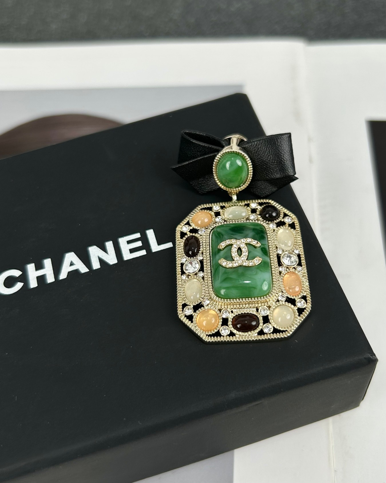 Chanel Leather Bow Multigem Emerald Brooch - Best Replica Jewelry™