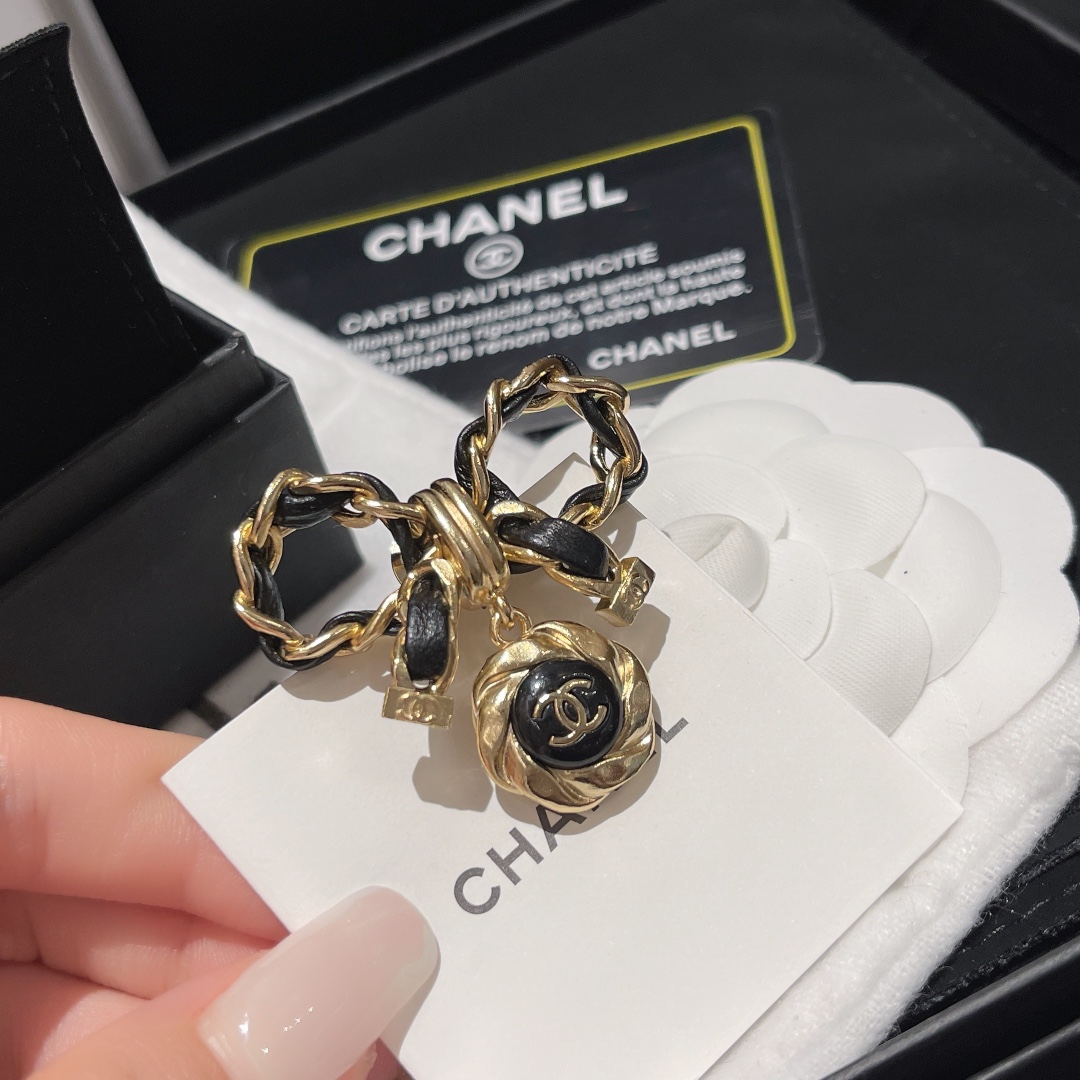 Chanel Black Leather Wrap Gold Bow Brooch - Best Replica Jewelry™