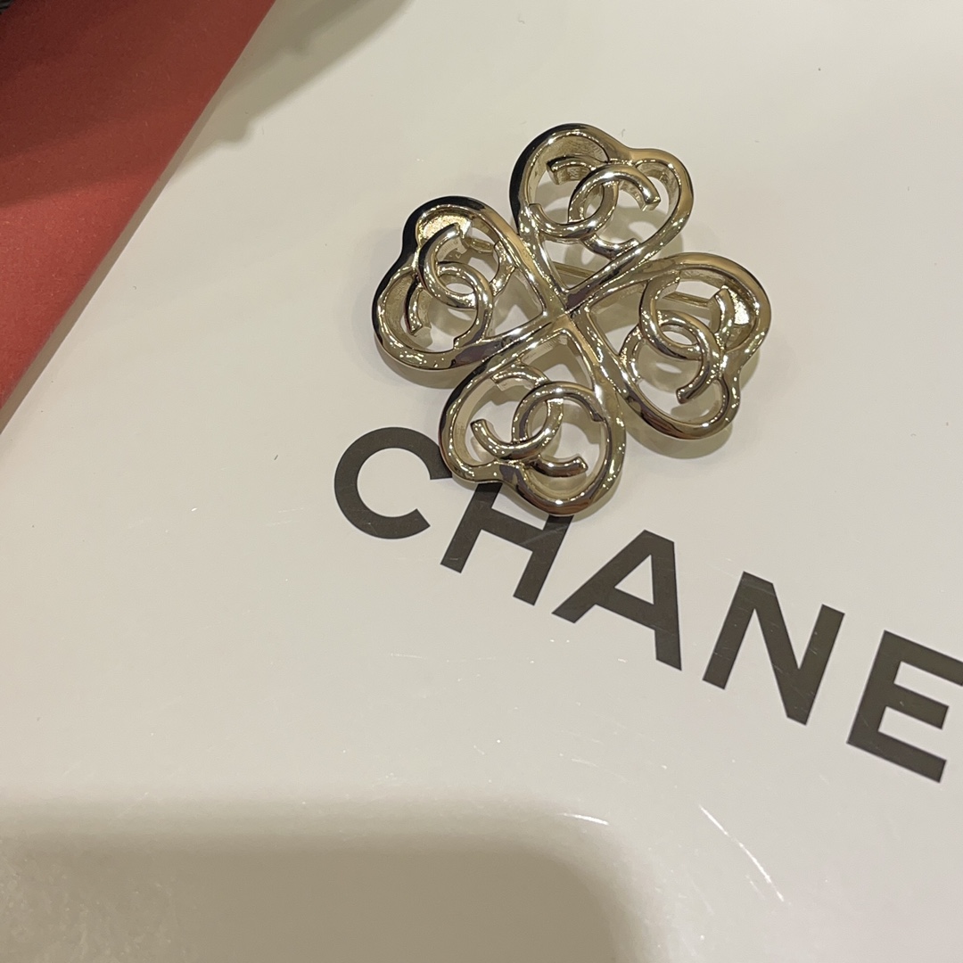 Chanel Light Gold Hollow Clover Brooch - Best Replica Jewelry™