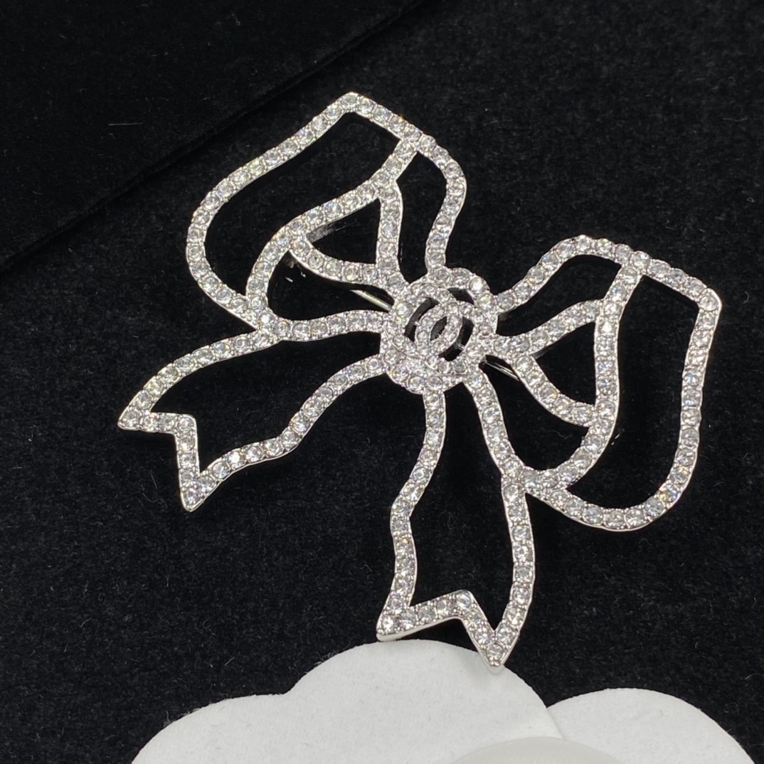 Chanel Full Diamond Paved Hollow Bow Silver Brooch - Best Replica Jewelry™