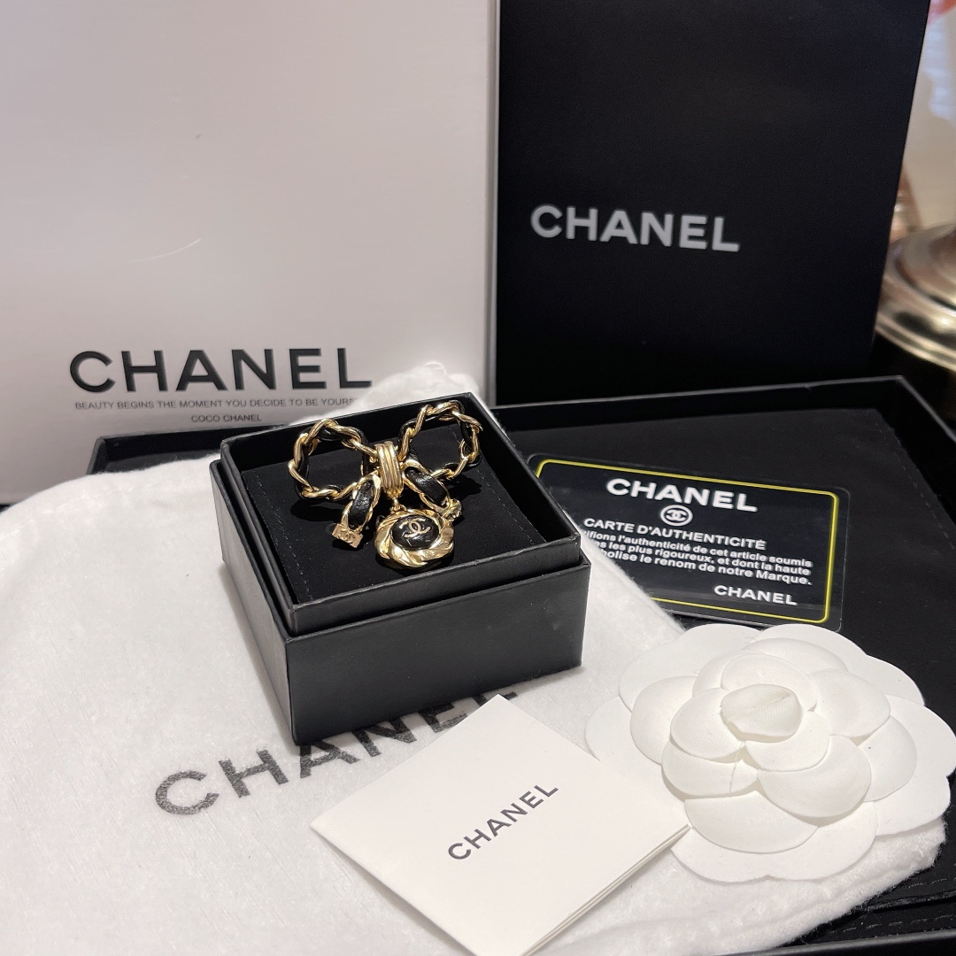 Chanel Black Leather Wrap Gold Bow Brooch - Best Replica Jewelry™