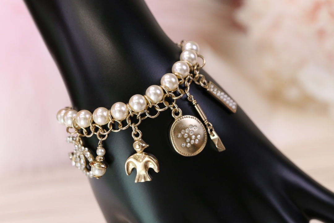 Chanel Bird CC Charms Chain Pearl Tassel Bracelet - Best Replica Jewelry™