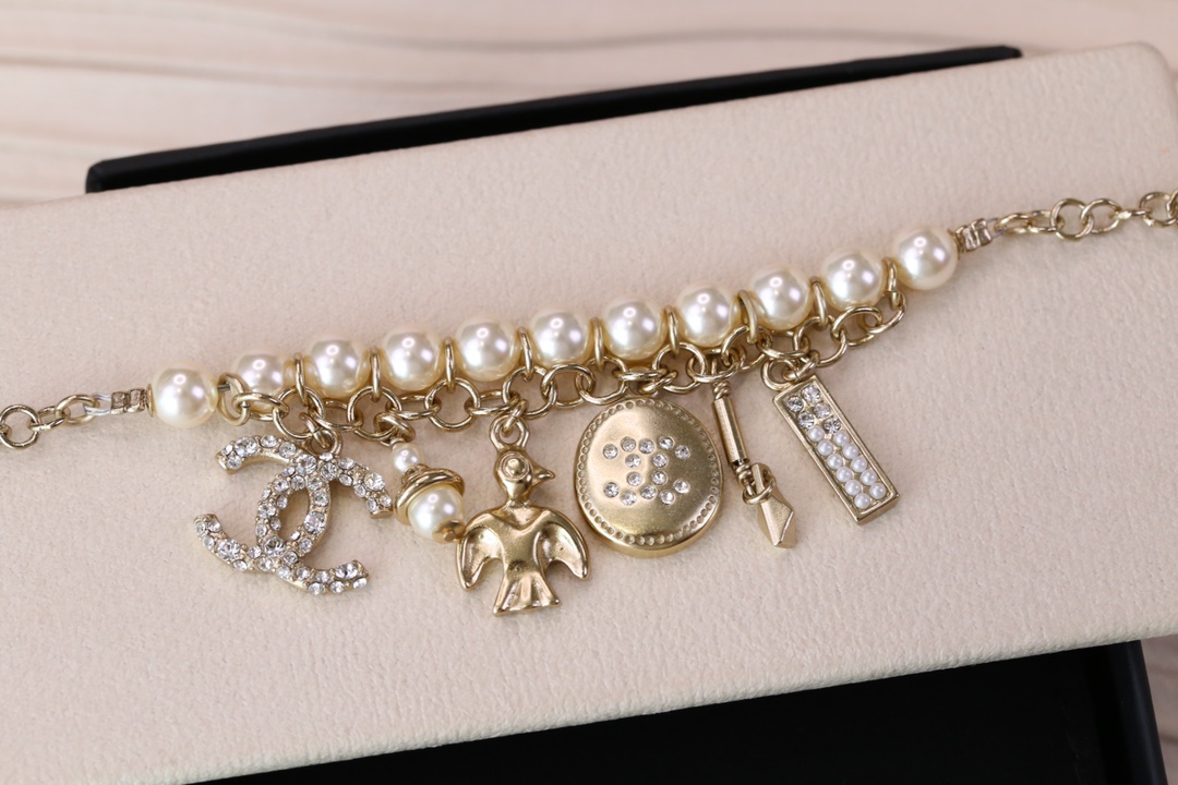 Chanel Bird CC Charms Chain Pearl Tassel Bracelet - Best Replica Jewelry™