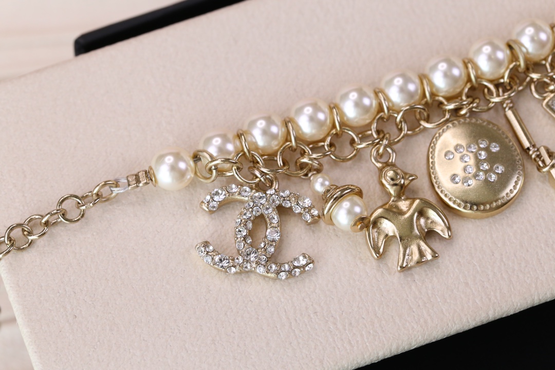 Chanel Bird CC Charms Chain Pearl Tassel Bracelet - Best Replica Jewelry™