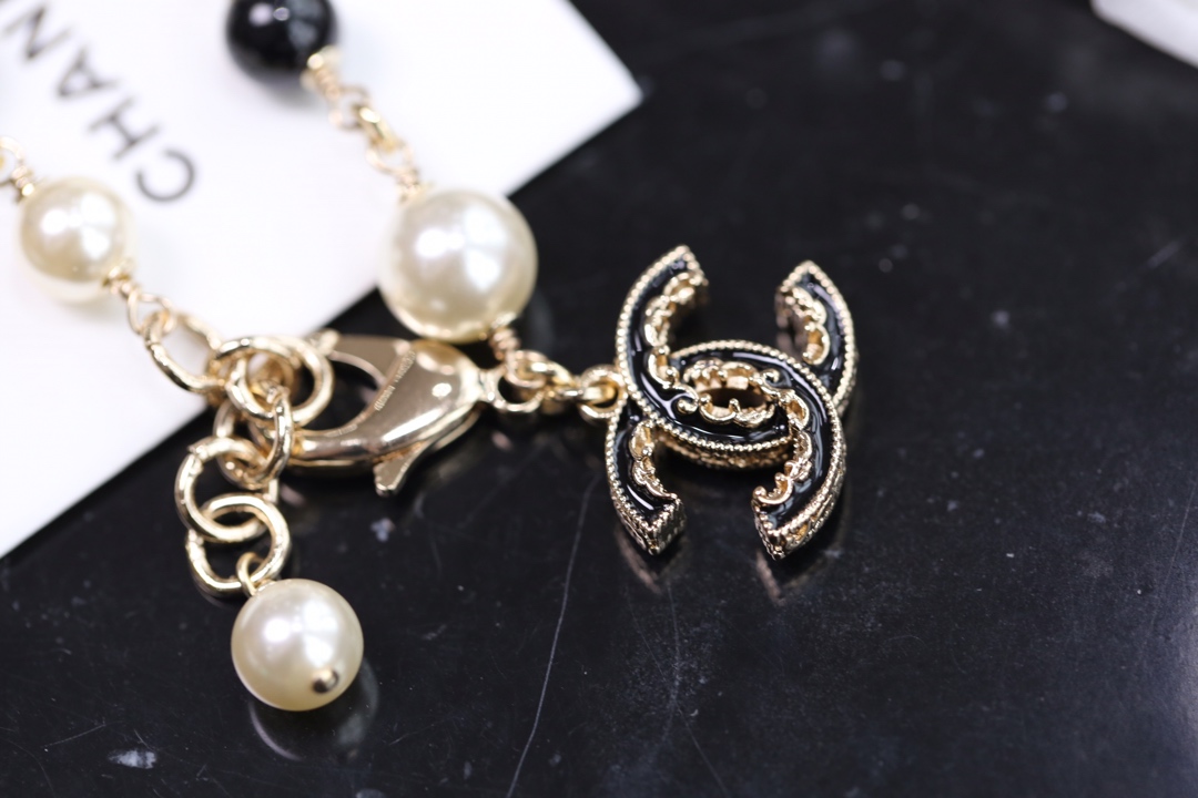Chanel Black Bead Vintage Pearl Bracelet with CC Charm - Best Replica Jewelry™
