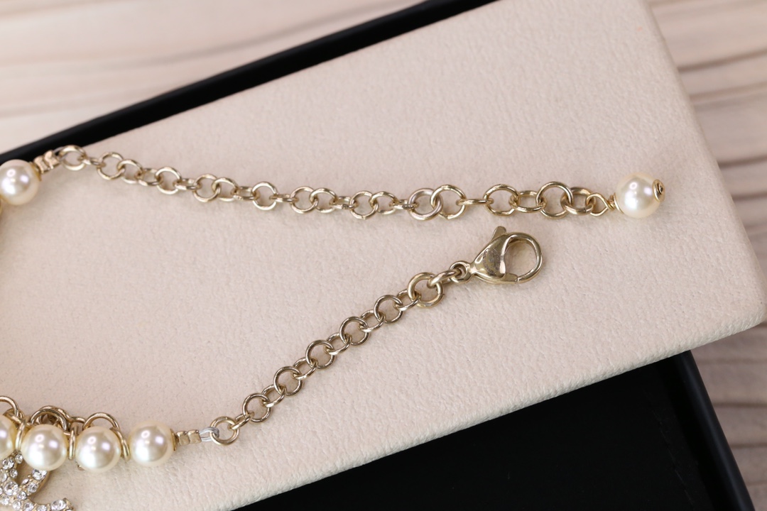Chanel Bird CC Charms Chain Pearl Tassel Bracelet - Best Replica Jewelry™