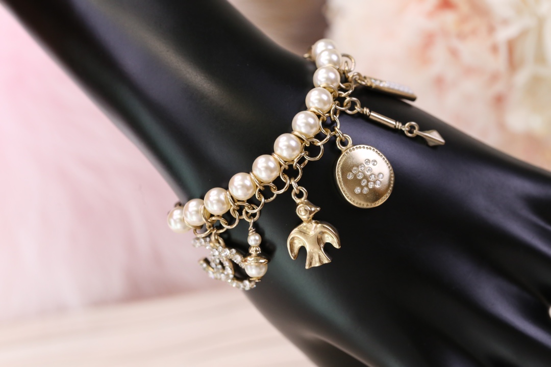 Chanel Bird CC Charms Chain Pearl Tassel Bracelet - Best Replica Jewelry™
