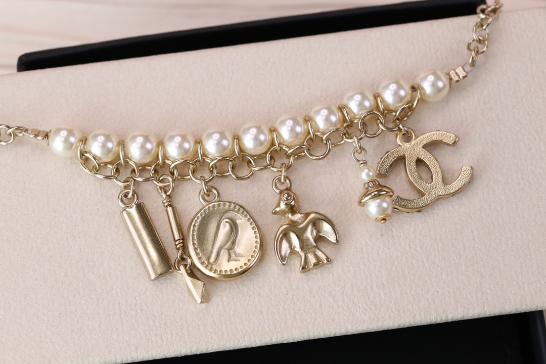 Chanel Bird CC Charms Chain Pearl Tassel Bracelet - Best Replica Jewelry™
