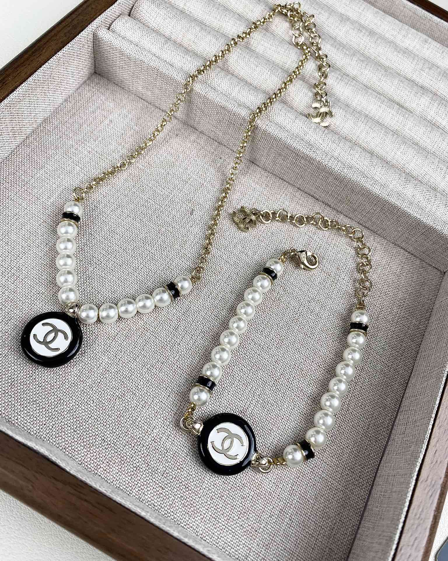 Chanel Black and White Round Charm Pearl Bracelet Necklace - Best Replica Jewelry™