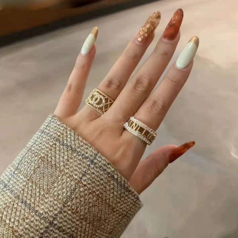 Chanel Light Gold Hollow Pearl CC Ring - Best Replica Jewelry™