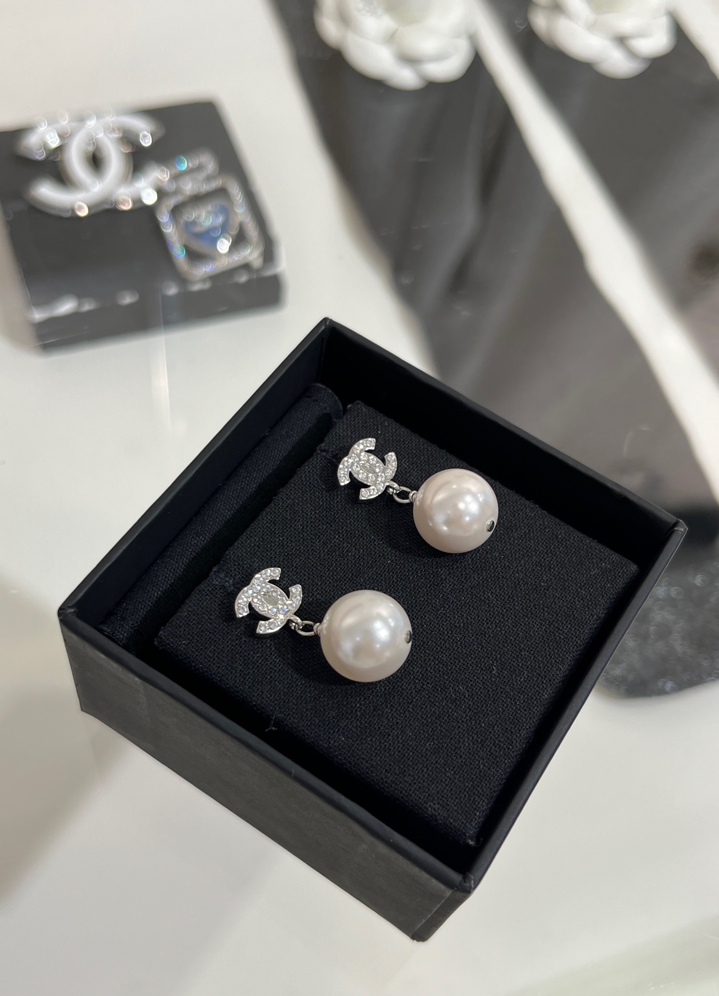Chanel Classic Silver Coco Pearl Drop Earrings - Best Replica Jewelry™