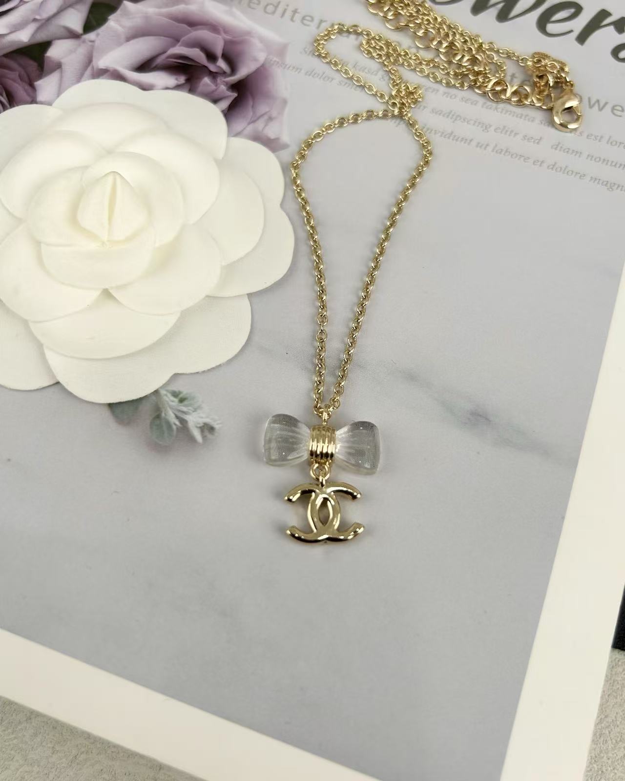Chanel Transparent Bow CC Pendant Necklace - Best Replica Jewelry™