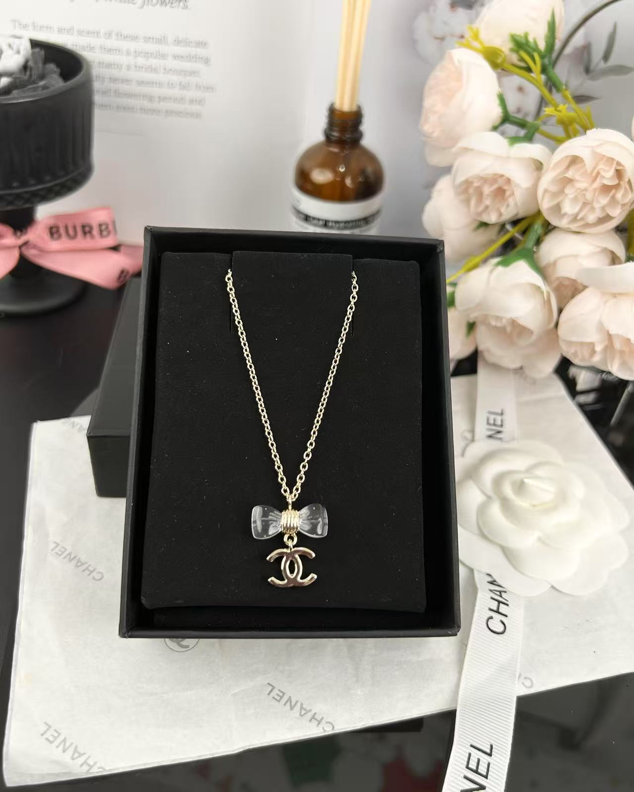 Chanel Transparent Bow CC Pendant Necklace - Best Replica Jewelry™