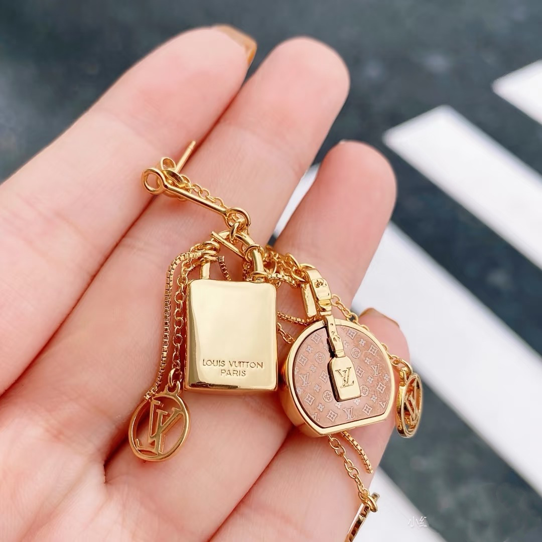 Louis Vuitton Asymmetric Lock and Handbag Tassel Earrings - Best Replica Jewelry™