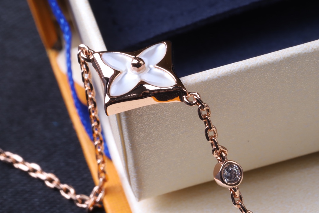 Louis Vuitton Minimalist White Mother of Pearl Star Bracelet - Best Replica Jewelry™