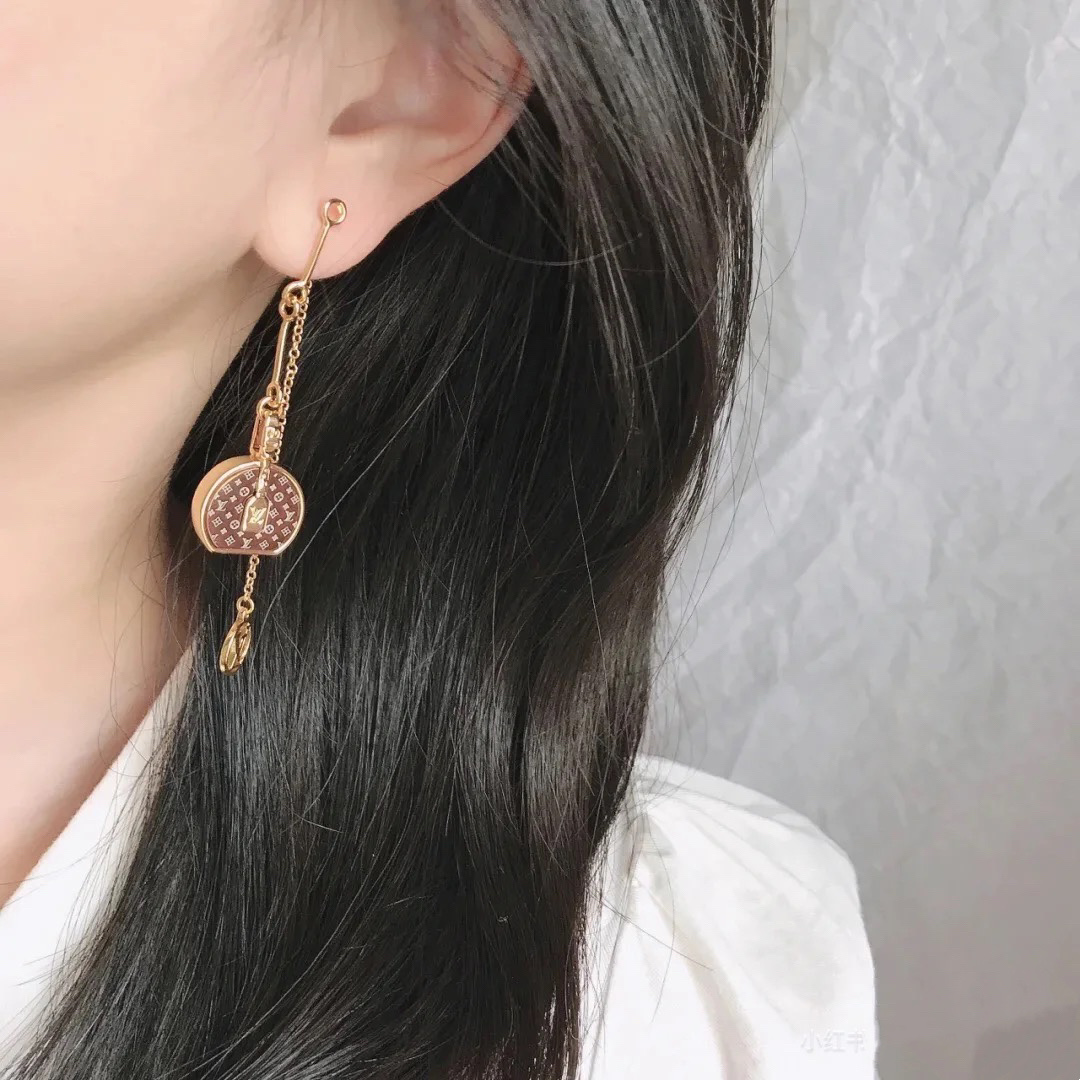Louis Vuitton Asymmetric Lock and Handbag Tassel Earrings - Best Replica Jewelry™