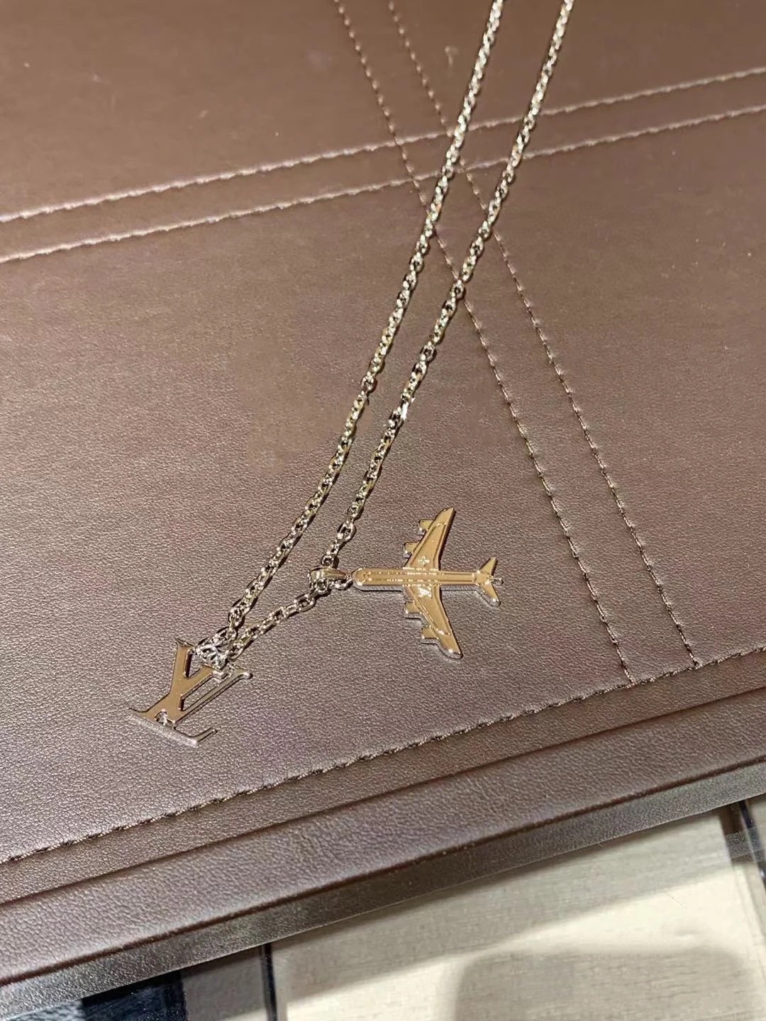 Louis Vuitton Silver LV Plane Mens Necklace - Best Replica Jewelry™
