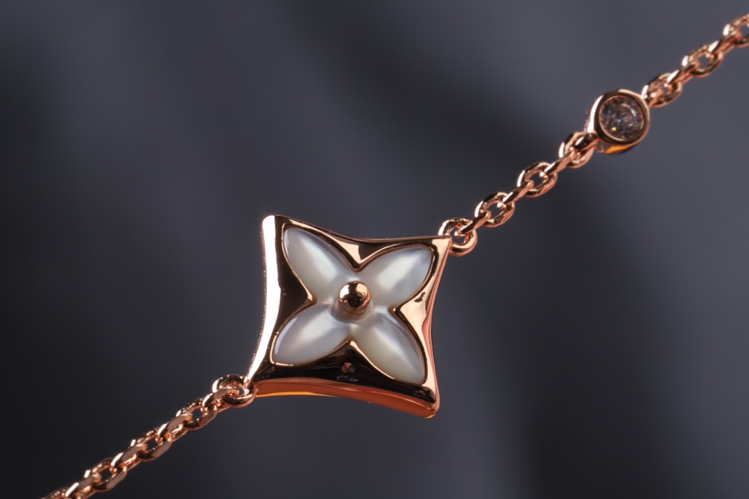 Louis Vuitton Minimalist White Mother of Pearl Star Bracelet - Best Replica Jewelry™
